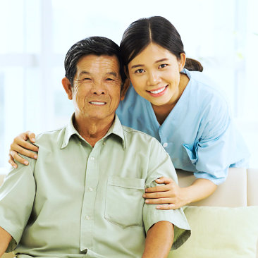 happy caregiver and senior man