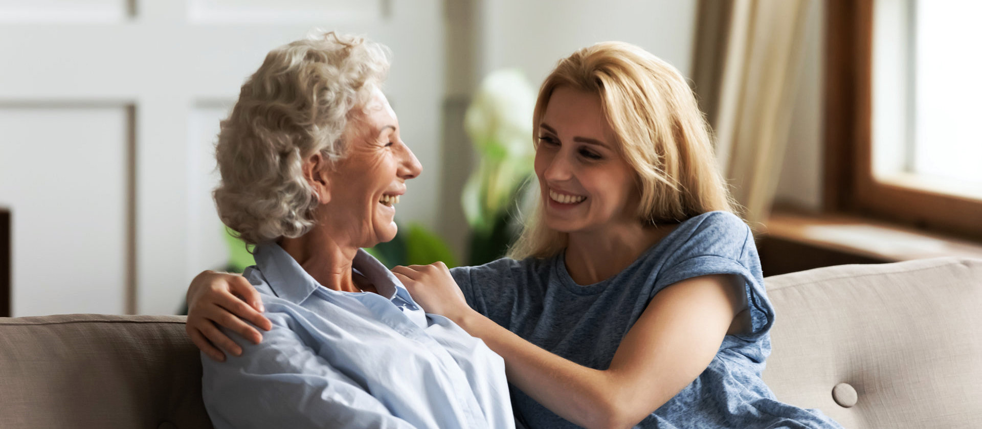 happy senior woman and her daughter