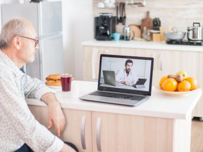 senior man using laptop